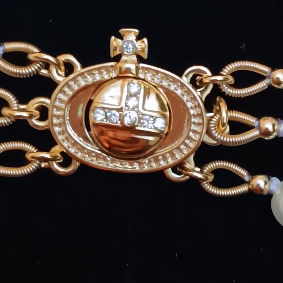 Vivian westwood pearl three strand necklace. Great for the holidays!. - Picture 6 of 7